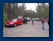 3 old men, hands in pockets, just looking